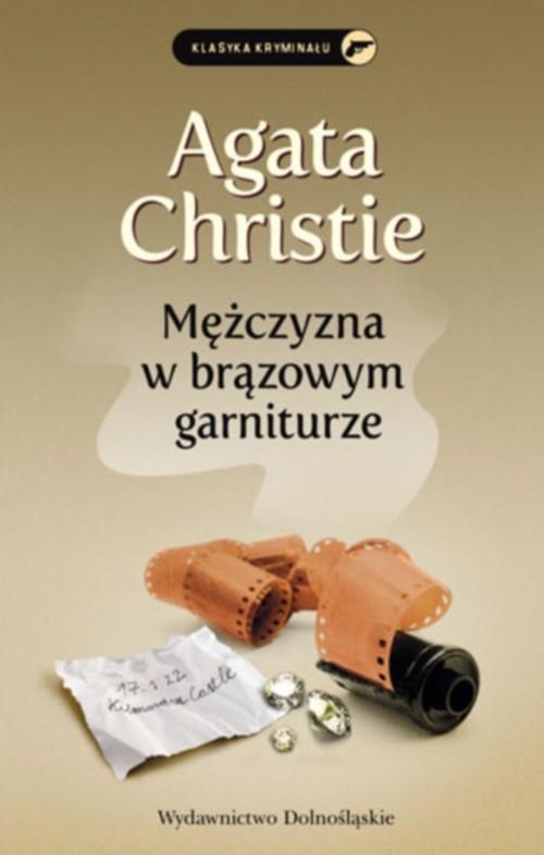 

Mężczyzna w brązowym garniturze Agatha Christie