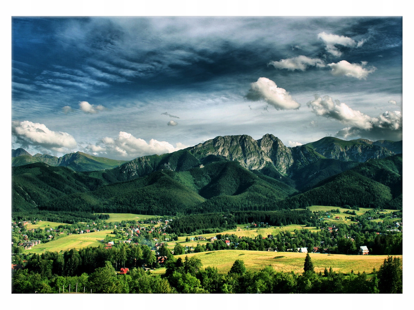 

Obraz płótno Tatry Słoneczny dzień w dolinie 70x50