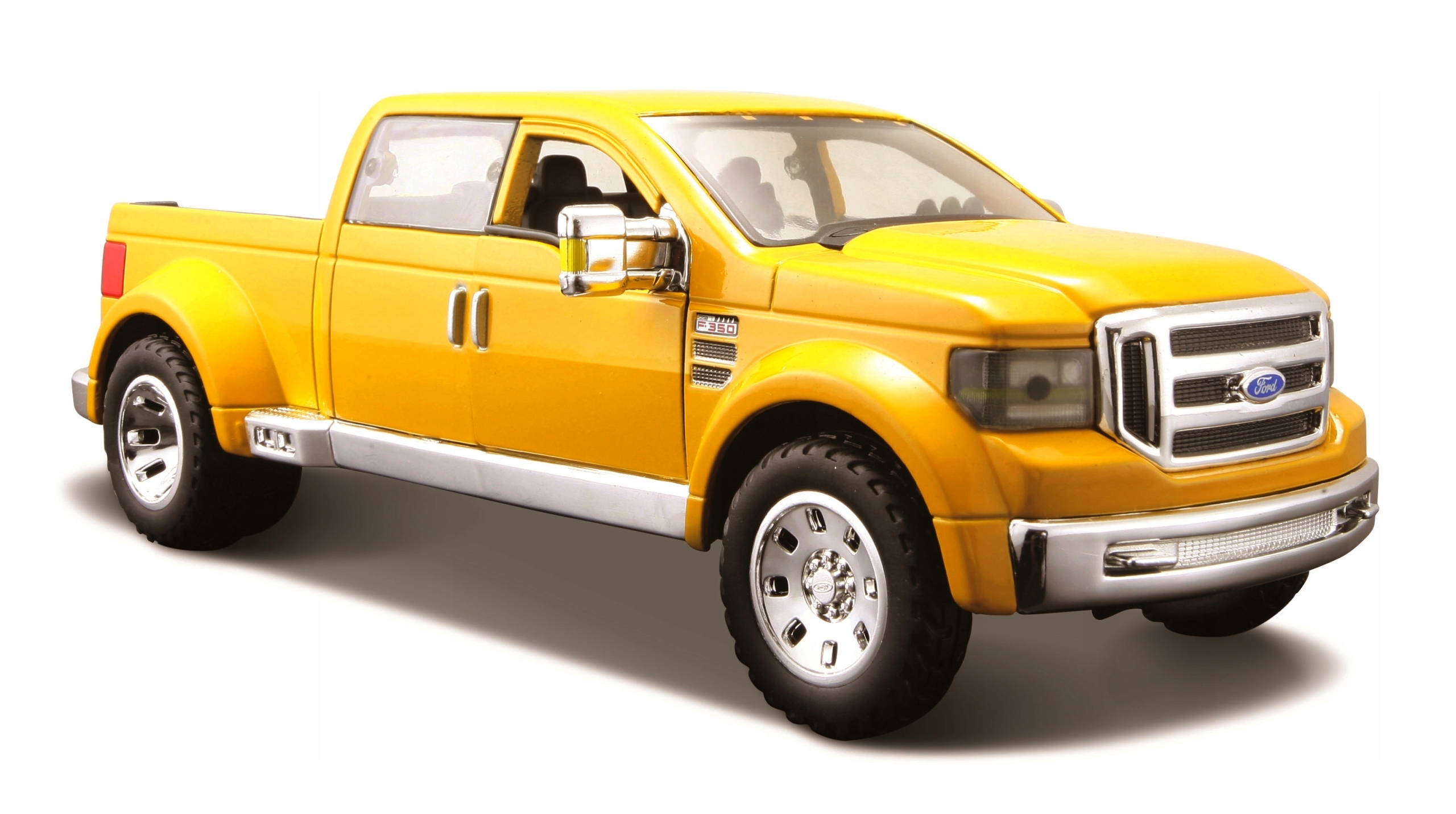 Модель Ford Mighty F - 350 Super Duty Maisto 31213 Колір dominujący відтінки żółtego i золотий foto 1