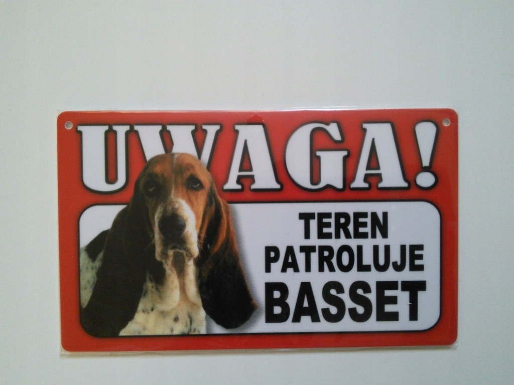 Tabliczka ostrzegawcza TEREN PATROLUJE BASSET