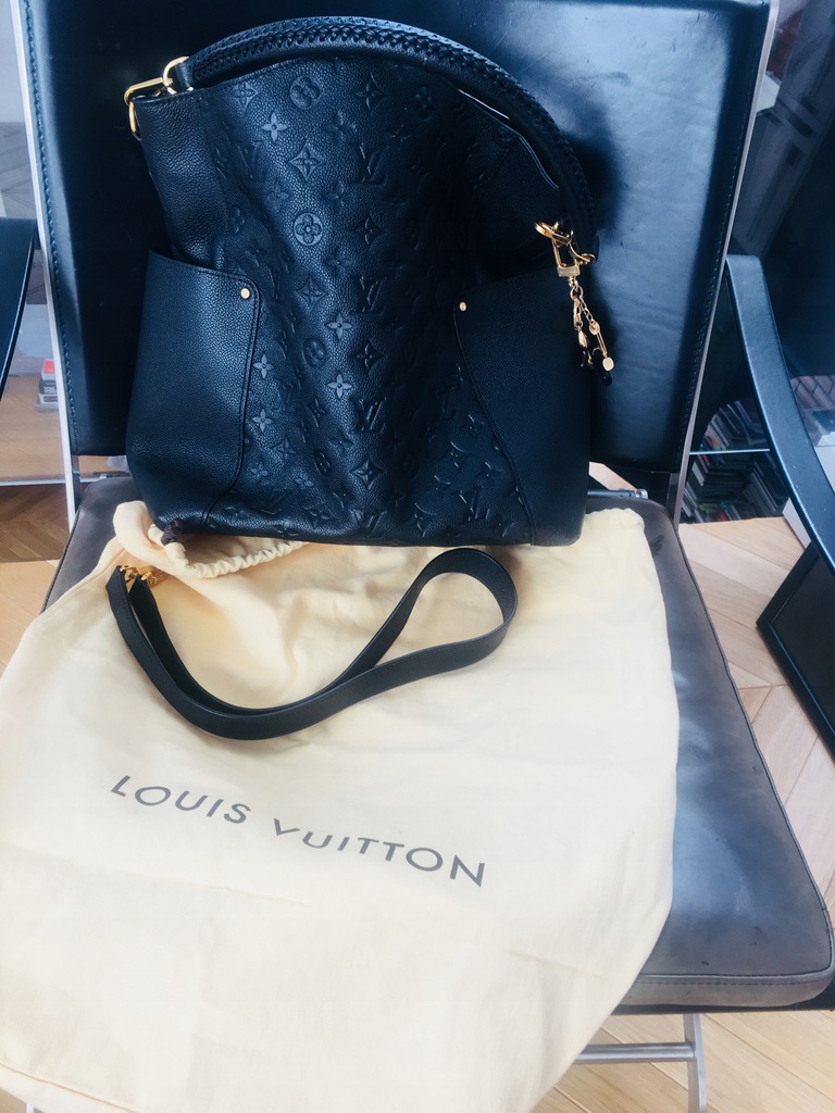 A Louis Vuitton vintage Monogram Canvas Homme Garment Bag. - Bukowskis
