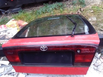 фото thumb №1, Кришка задня скло зад накладка замок toyota corolla gli оригінальний номер