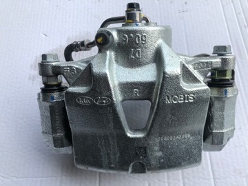 Hyundai tucson ii суппорт тормозной правые переднее фото №1