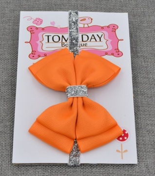 Elegancka opaska z dużą KOKARDĄ POMARAŃCZOWA