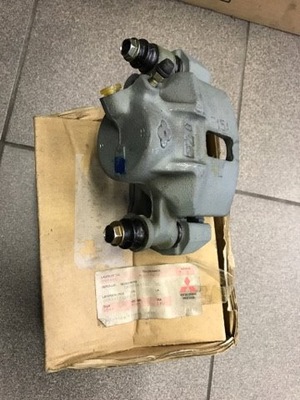 Lancer iv суппорт тормозной левый перед новый oryg фото №1