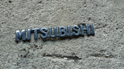 Mitsubishi colt 04-12 эмблема крышки багажника фото №1
