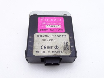 Mitsubishi l200 96-06 модуль центрального замка фото №1