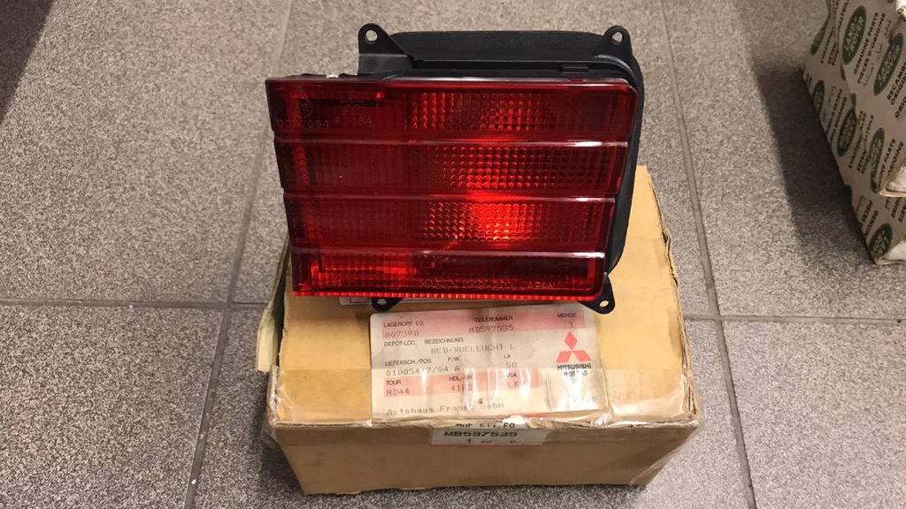 фото №1, Galant 88-92 лампа противотуманные задняя nowa oryg